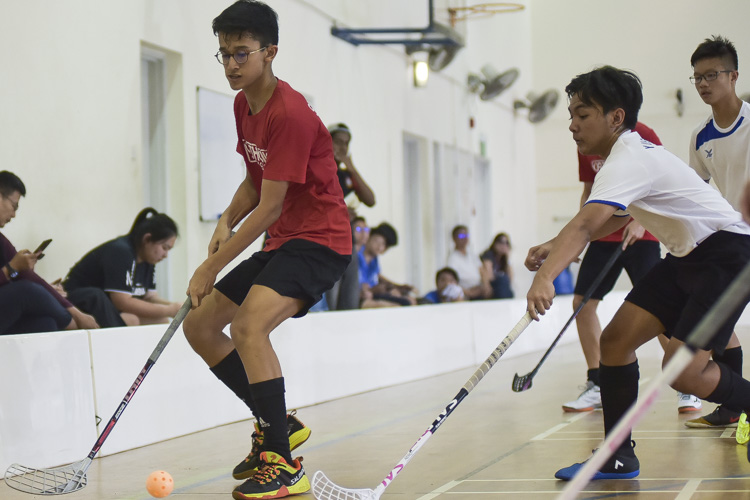 Shamin Lee (CHS #19) fends the ball from his opponents. (Photo 1 © Iman Hashim/Red Sports)