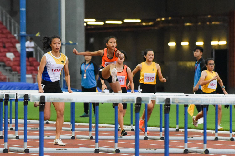 Tyeisha Khoo of Singapore Sports School clears a hurdle. She finished with the silver in the B Division girls' 100m hurdles final with a time of 15.80s. (Photo X © Iman Hashim/Red Sports)