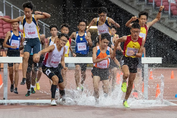 Loh Wei Long (#638) of Yuan Ching Secondary School won the B Division Boys' 2000m steeplechase final with a time of 06:54.53.