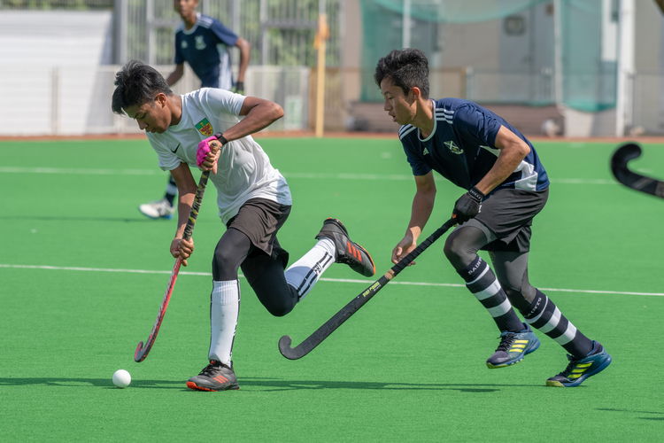 Ryu Tanaka (SAJC #7) tries to get the ball back from Muhammad Haikel B Yasin (RI #66).