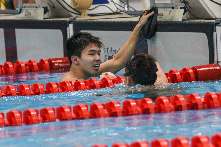 Jonathan Tan of ACS(I) and Glen Lim of RI congratulate each other after the A Division boys' 200m Medley Relay final. (Photo 1 © Iman Hashim/Red Sports)