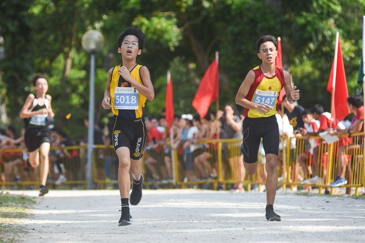 ACS(I)'s Ryan Wong (#5018) finished fifth in the Boys’ C Division cross country race with a time of 14:03.1. (Photo 1 © Iman Hashim/Red Sports)