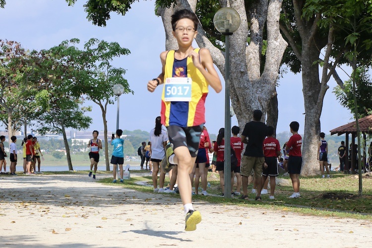 ACS(I)'s Ferrell Lee finished first in the Boys’ C Division cross country race with a time of 13:36.8. (Photo 1 © Julianna Jothi/Red Sports)