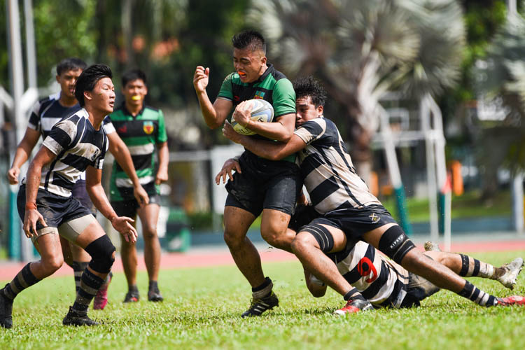 Raffles Institution (RI) survived a late gutsy fightback from St. Andrew’s Junior College (SAJC) to edge past their traditional rivals 17-15 and book their place in the final of the National A Division Rugby Championship. (Photo 1 © Iman Hashim/Red Sports)