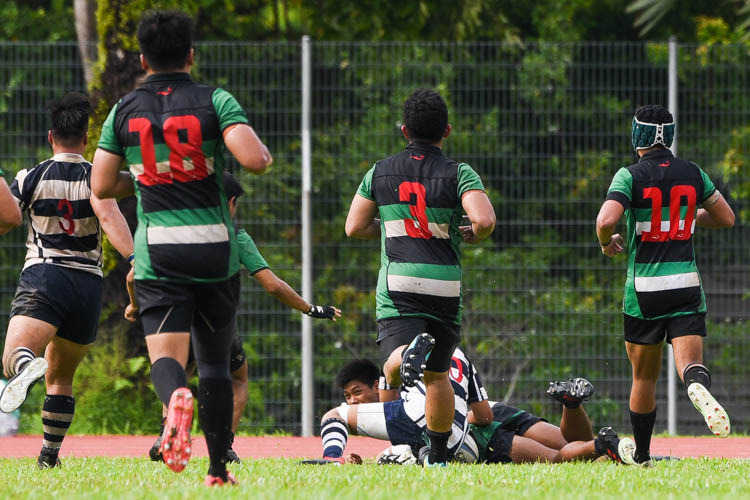 Raffles Institution (RI) survived a late gutsy fightback from St. Andrew’s Junior College (SAJC) to edge past their traditional rivals 17-15 and book their place in the final of the National A Division Rugby Championship. (Photo 1 © Iman Hashim/Red Sports)