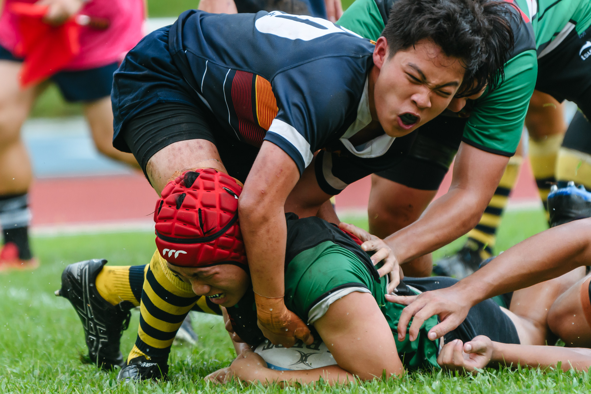 RI’s Ernest Matthias Yap (#6) scores over the try line. (Photo 6 © Joash Chow/Red Sports)