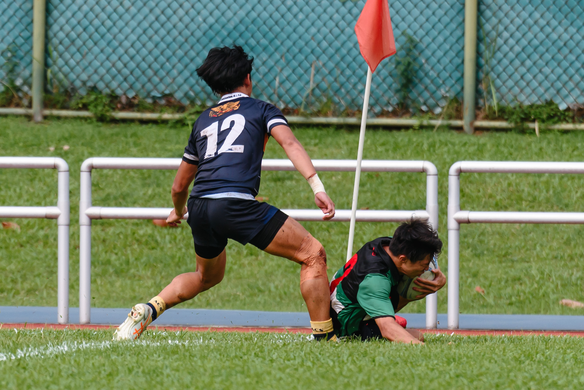 RI’s Luke Chai (#7) dives in for his second try untouched. (Photo 10 © Jared Chow/Red Sports)
