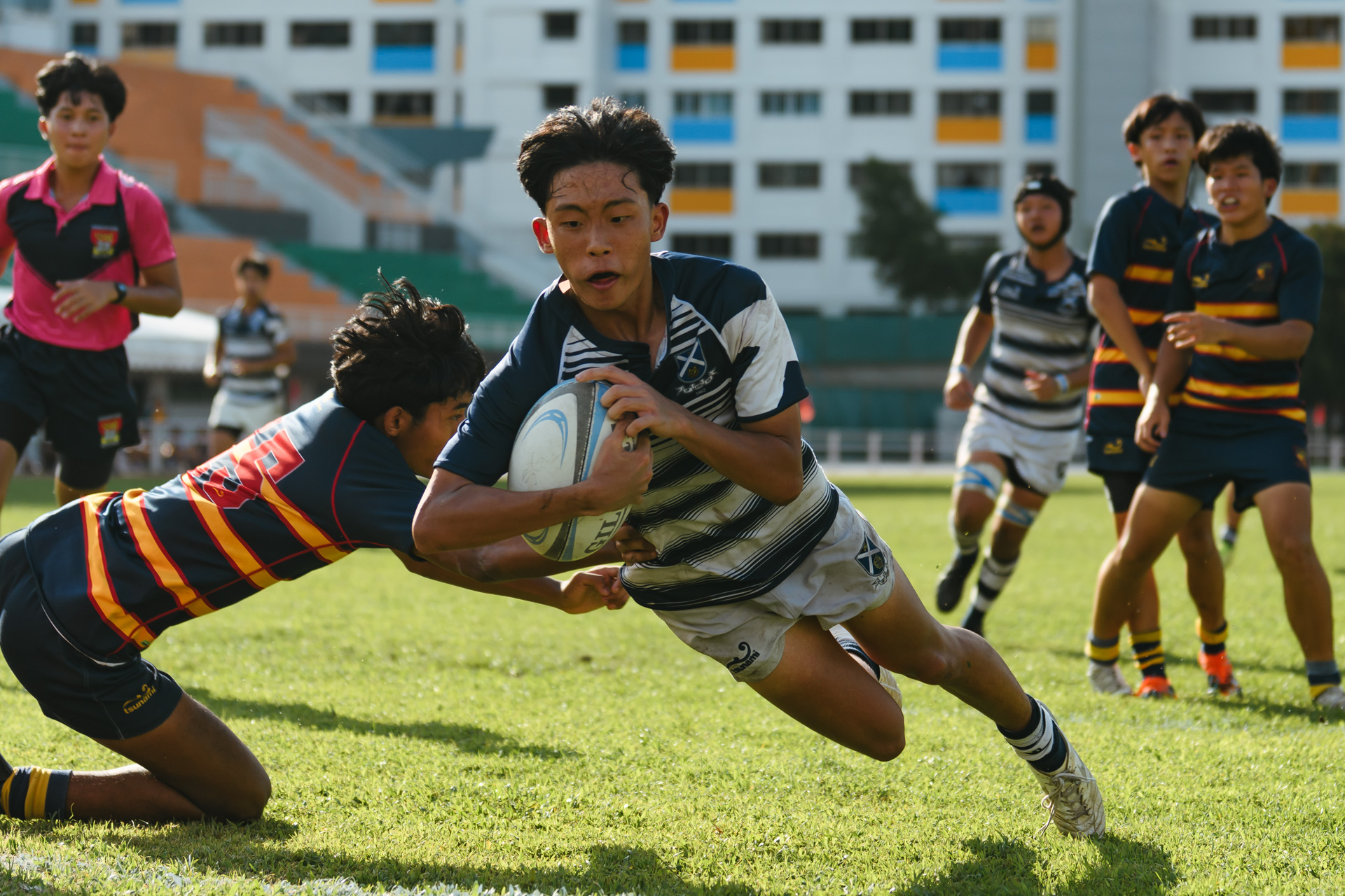 St. Andrew’s Ashton Lim (#9) dives in for the try. (Photo 9 © Joash Chow/Red Sports)