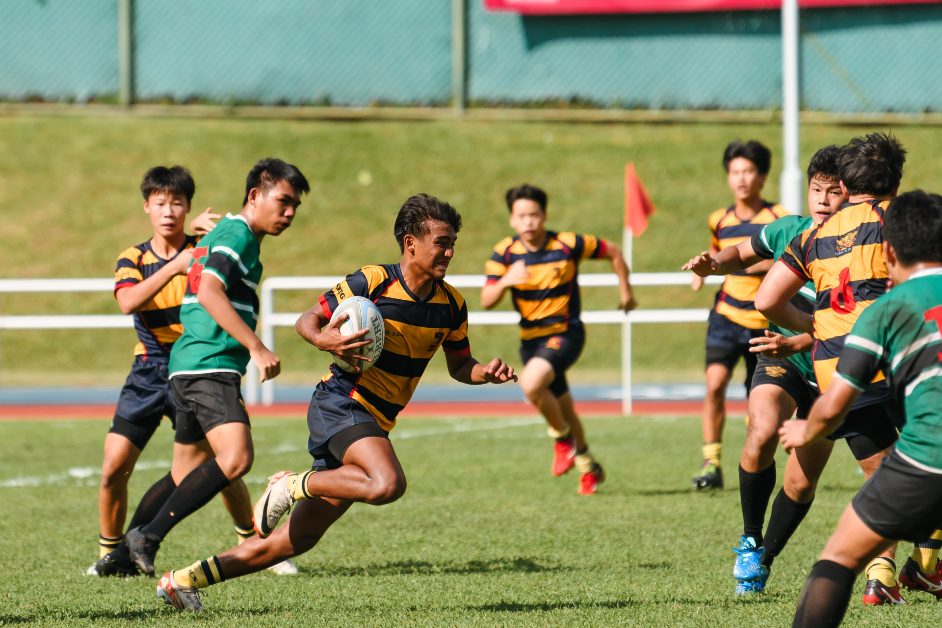 An ACS(I) player on a burst as he eyes a gap. (Photo 23 © Joash Chow/Red Sports)