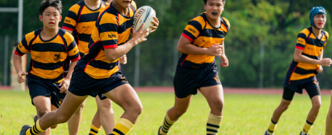 Asher Pei (AC #12) carries the ball. (Photo 5 © Bryan Foo/Red Sports)