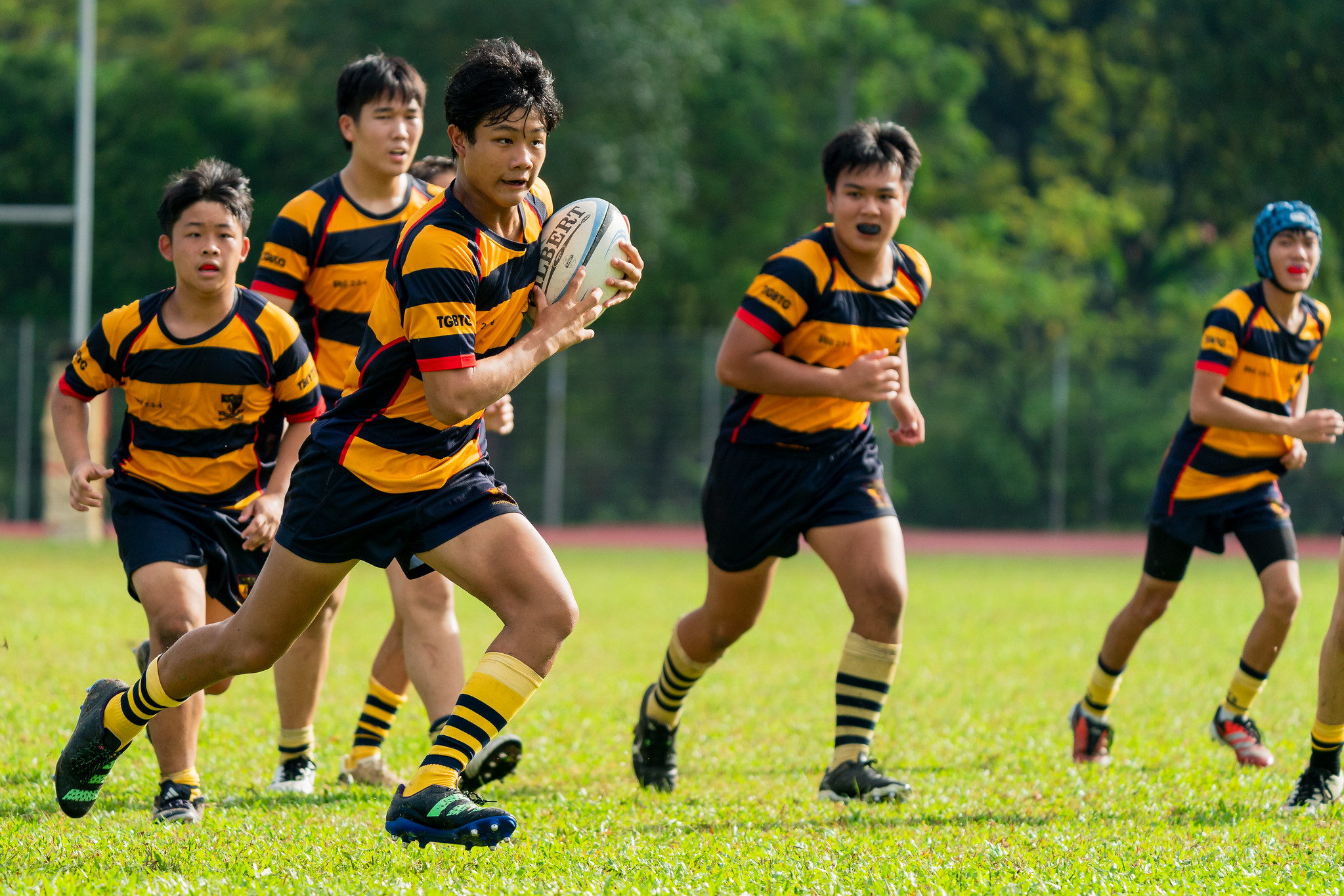 Asher Pei (AC #12) carries the ball. (Photo 5 © Bryan Foo/Red Sports)