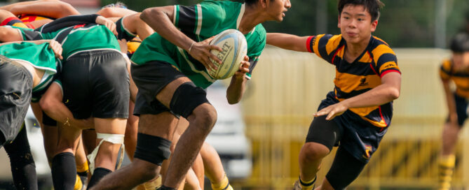 Onith Senaratne (RI #8) picks the ball from a scrum. (Photo 8 © Bryan Foo/Red Sports)