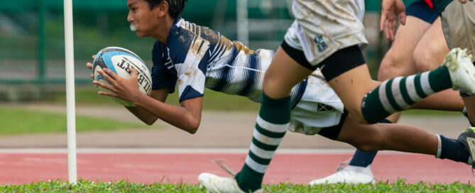 Isaac Nair (SA #24) scores a try. (Photo 8 © Bryan Foo/Red Sports)