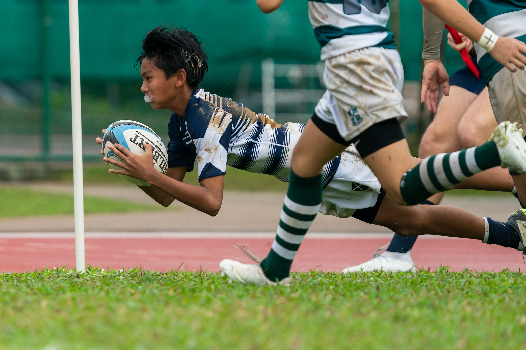 Isaac Nair (SA #24) scores a try. (Photo 8 © Bryan Foo/Red Sports)